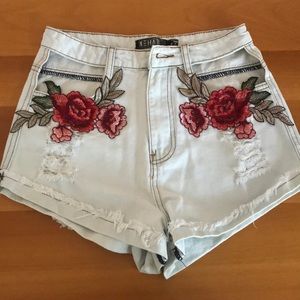 Rose embroidered jean shorts